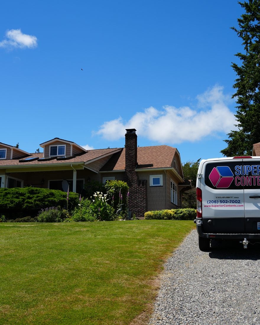 A Superior Contents delivery van returning belongings to a client's home